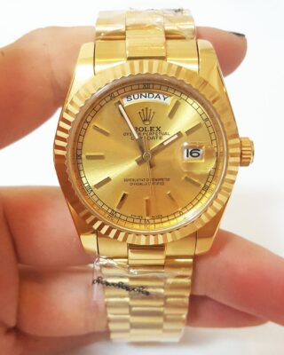 Day-Date Champagne Dial 1803 Close-Up Focus
