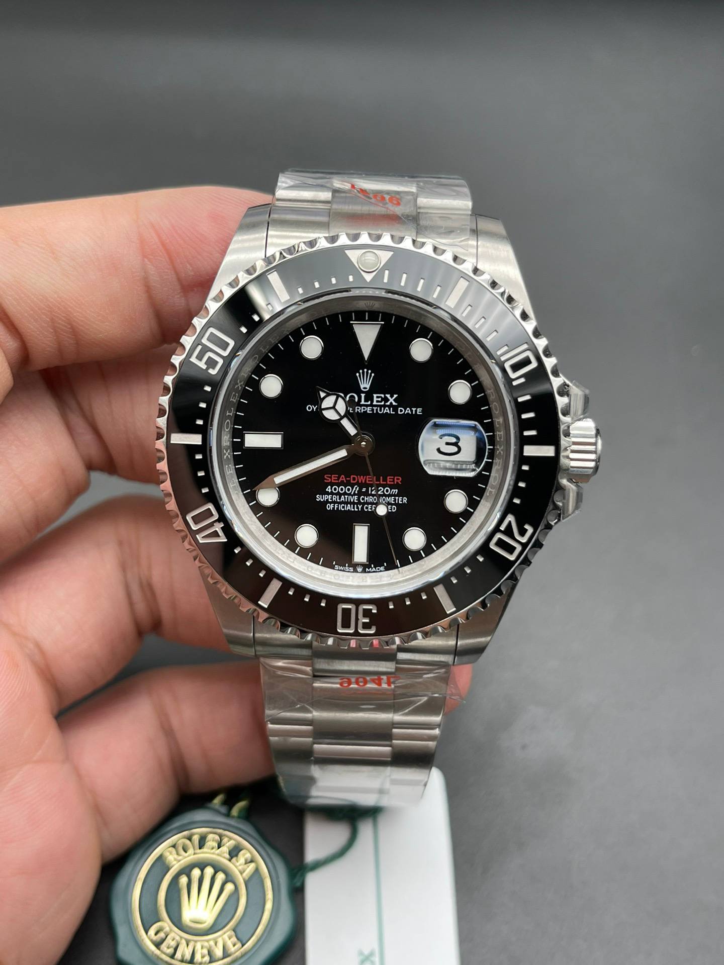 Rolex Sea-Dweller 126600 Replica In Hand Front View
