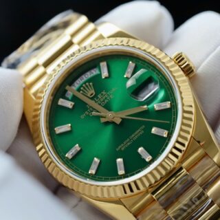 Day-Date Fluted Bezel Green Dial Presidential Bracelet on white glove