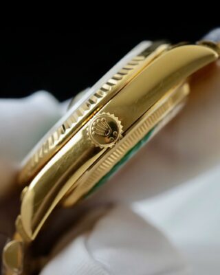 Day-Date Fluted Bezel Green Dial Presidential Bracelet on white glove
