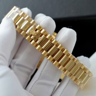 Day-Date Fluted Bezel Green Dial Presidential Bracelet on white glove