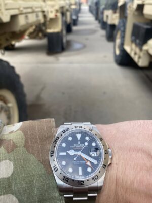 Explorer on the wrist of a military man