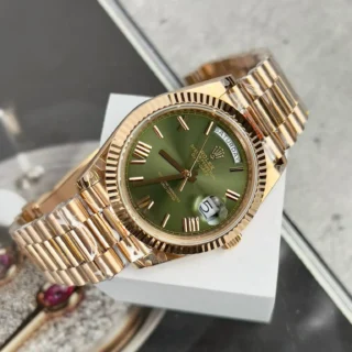 Day-Date. Olive Dial Fluted Bezel Rose Gold Presidential Bracelet