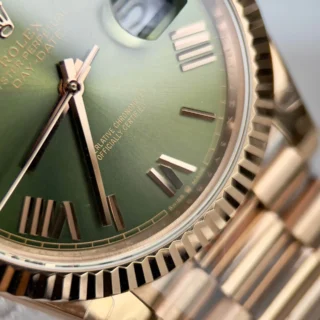 Day-Date. Olive Dial Fluted Bezel Rose Gold Presidential Bracelet