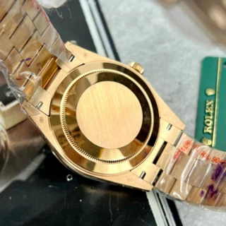 Day-Date. Olive Dial Fluted Bezel Rose Gold Presidential Bracelet