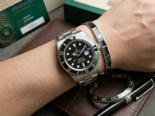 Close-up of a wrist wearing a sleek Black Submariner Titanium Steel Bracelet perfectly paired with a Submariner watch.
