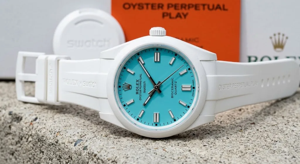 Oyster Perpetual Play concept watch - clean colorful dial in bioceramic, Swatch Rolex collaboration render